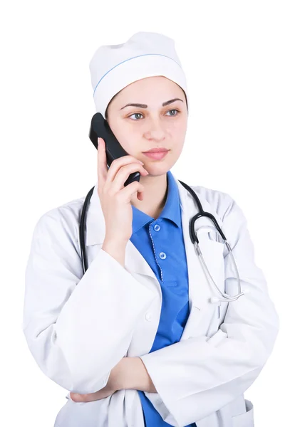 Mulher médico segura o telefone — Fotografia de Stock