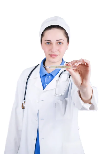 Médico mulher segura um termômetro na mão — Fotografia de Stock