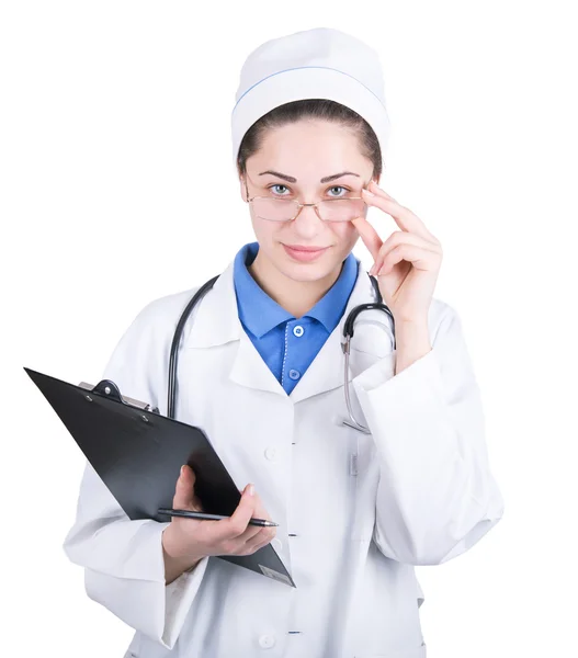 Médico mulher em óculos e com um comprimido na mão — Fotografia de Stock