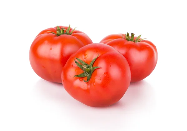 Tre pomodori rossi maturi — Foto Stock