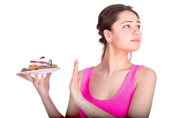 Sports girl refuses sweets — Stock Photo, Image