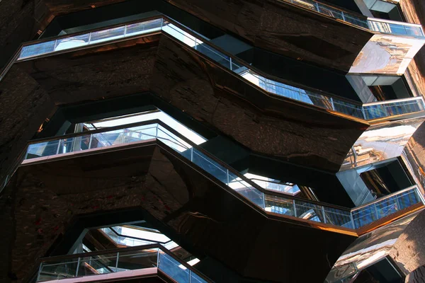 Symmetries and faces of the Vessel in Hudson Yards in Manhattan