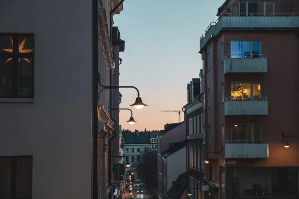 Evening street in Stockholm. Cozy winter atmosphere. Warm lighting.