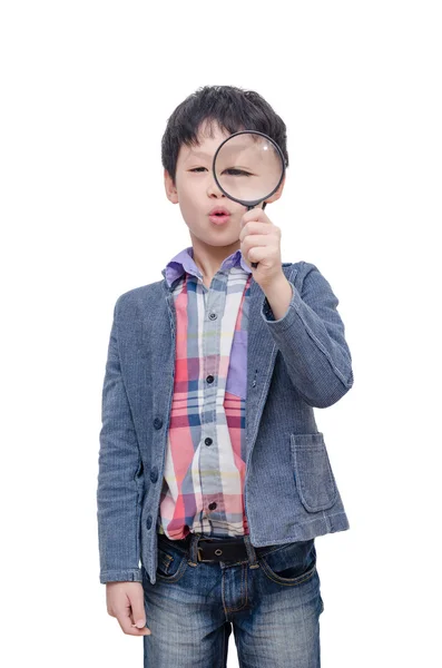 Pojke med förstoringsglas över vita — Stockfoto