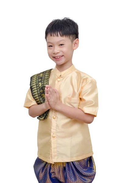 Thai boy in traditional dress doing gesture welcome — Stock Photo, Image