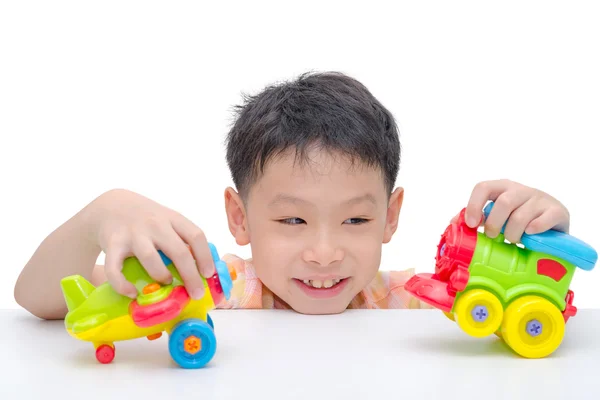 Jongen speelgoed spelen over Wit — Stockfoto