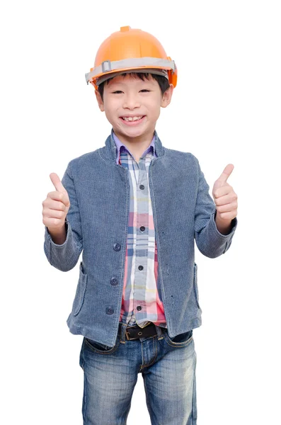 Chlapče nosit helmu a ukazuje palec nahoru — Stock fotografie
