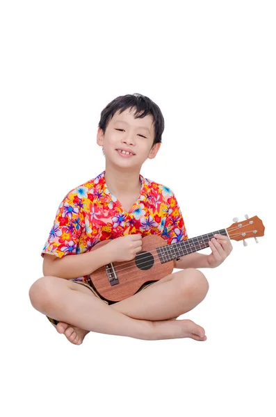 Jongen met ukulele op witte achtergrond — Stockfoto