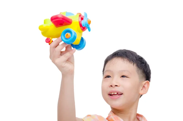 プラスチック平面で遊ぶ少年 — ストック写真
