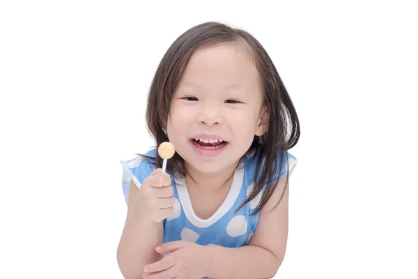 Küçük kız bir lolipop tutan — Stok fotoğraf