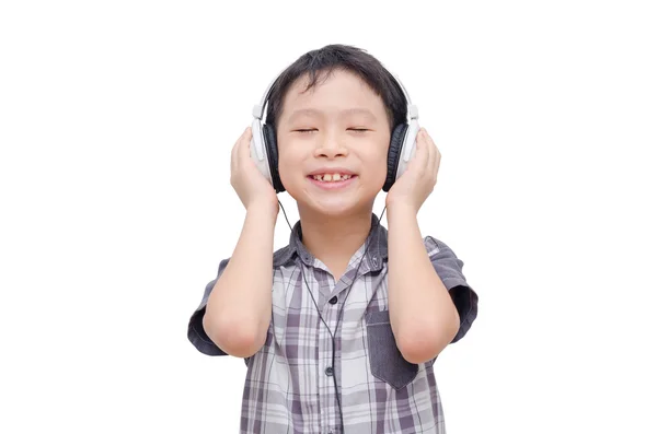 Fiú hallgat zenét a fejhallgató — Stock Fotó