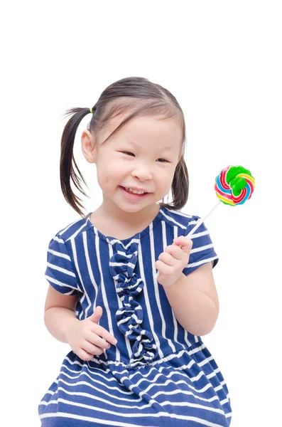 Girl holding lollipop over white background — Stock Photo, Image