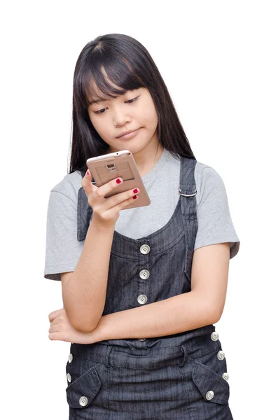 Chica escribiendo mensaje en el teléfono celular sobre blanco —  Fotos de Stock