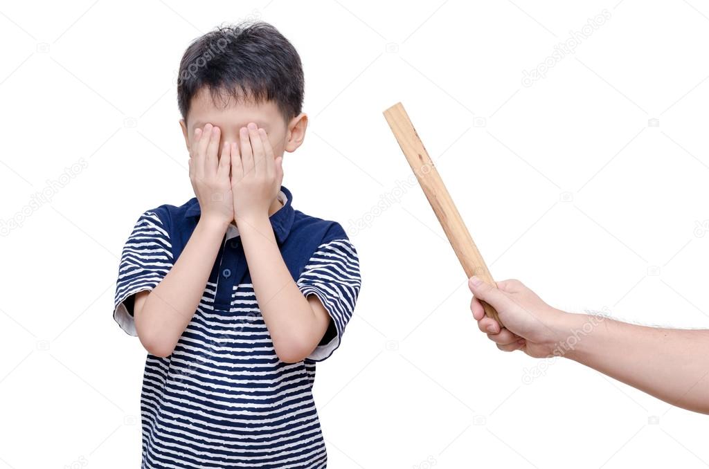 boy close his face by hands between father hit him 