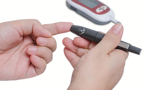 Hand testing for high blood sugar — Stock Photo, Image