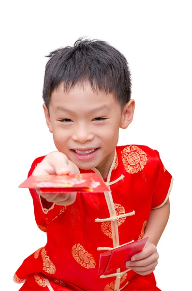 Asiatiska pojke med kinesiska traditionell klädsel holding ang pow — Stockfoto