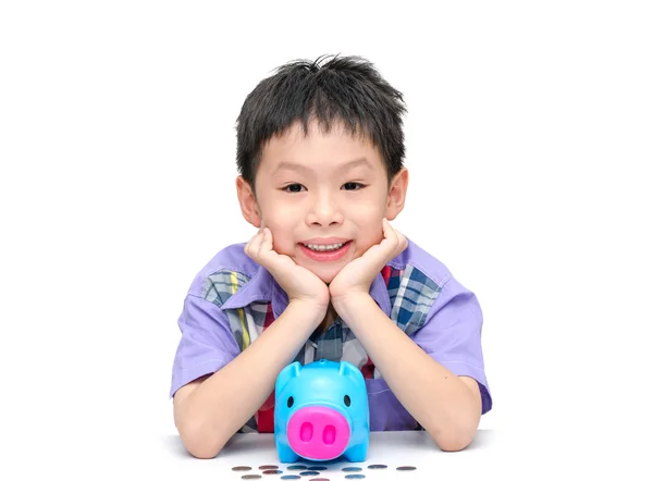 微笑的男孩带存钱罐 — 图库照片