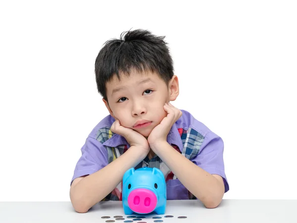 Asiático chico pensando qué comprar con sus ahorros —  Fotos de Stock