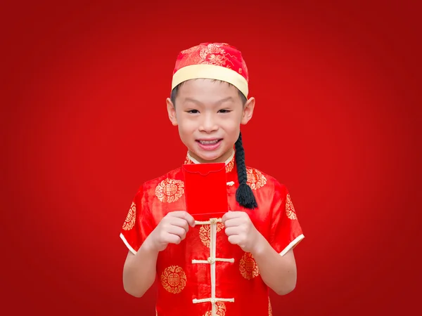 Boy holding ang pow — Stock Photo, Image