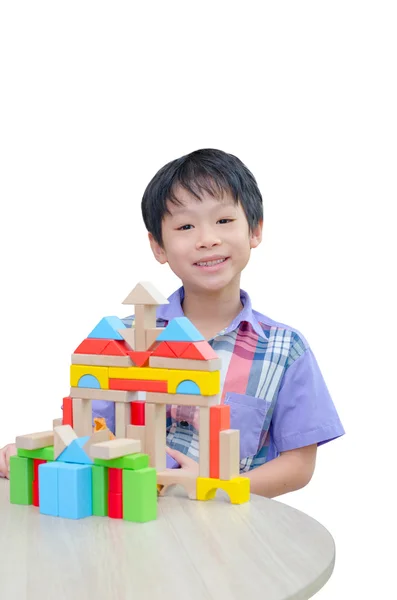 Ázsiai fiú játék blokkok táblázat — Stock Fotó