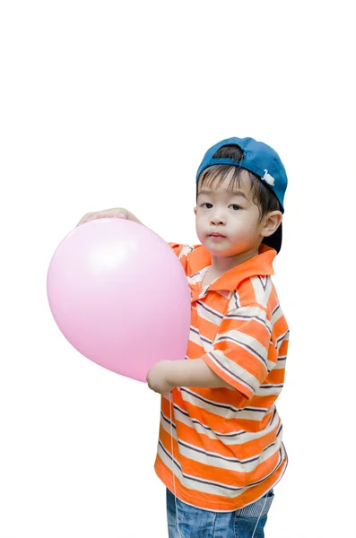 Menino segurando balão rosa — Fotografia de Stock