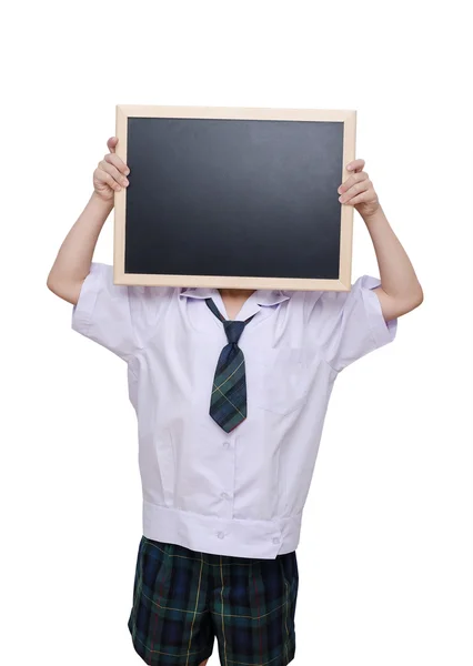Азиатский школьник держит доску — стоковое фото
