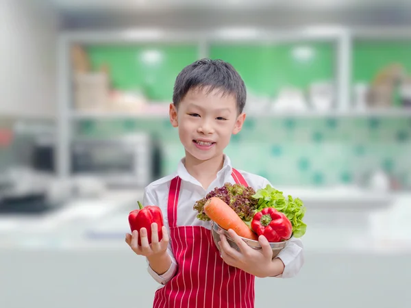 Little boy chef in kitchen — Stock Photo, Image