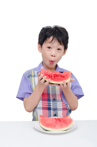 Boy eating watermelon — Stock Photo, Image