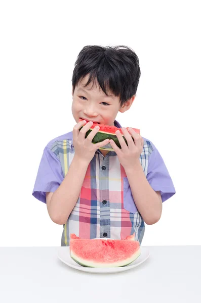 Boy eating watermelon — Stock Photo, Image