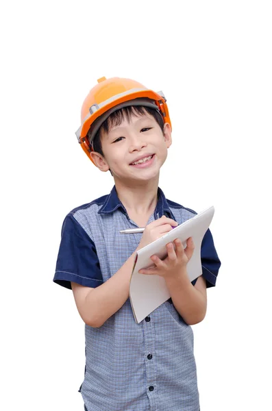 Niño con el casco escrito en el cuaderno — Foto de Stock