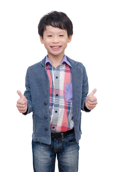 Pojke ler och visar tummen upp — Stockfoto