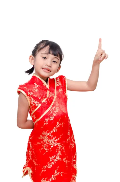 Menina em chinês vestido tradicional ponto para o espaço acima — Fotografia de Stock