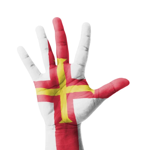 Öppen hand upp, multi purpose koncept, Guernsey flagga målade - — Stockfoto