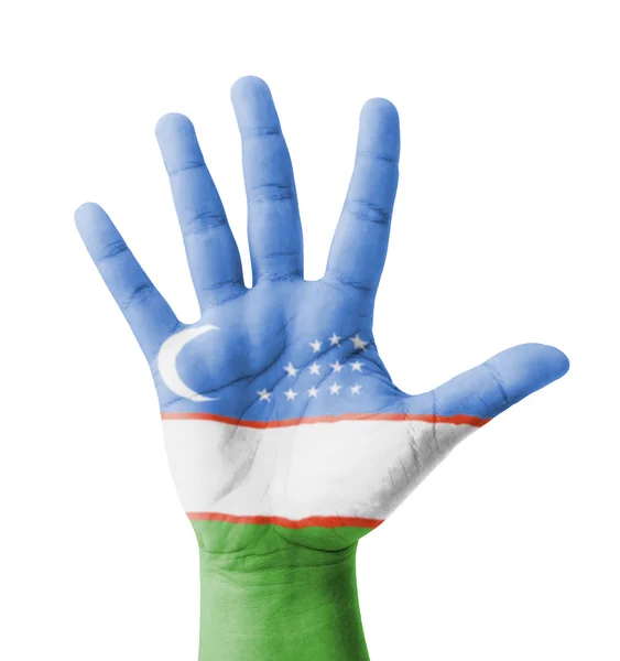 Mão aberta levantada, conceito multiúso, bandeira do Uzbequistão pintada — Fotografia de Stock