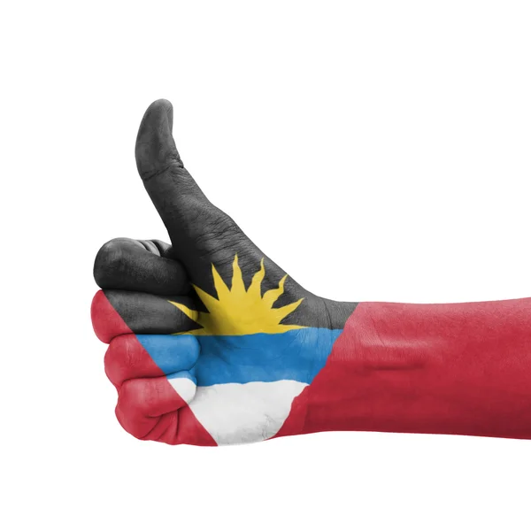 Hand with thumb up, Antigua and Barbuda flag painted as symbol o — Stock Photo, Image