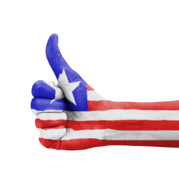 Mano con pollice in su, Bandiera Liberia dipinta come simbolo di eccellenza — Foto Stock