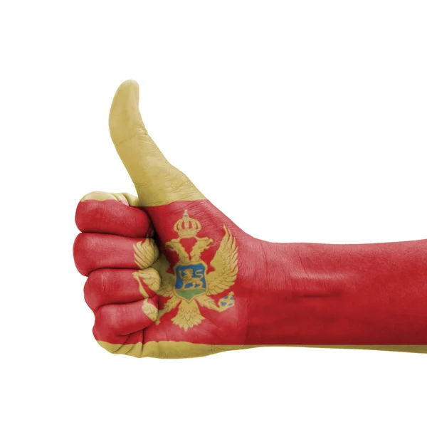 Χέρι με τον αντίχειρα επάνω, Μαυροβούνιο σημαία ζωγραφισμένο ως σύμβολο του πετρελαίου VO — Φωτογραφία Αρχείου