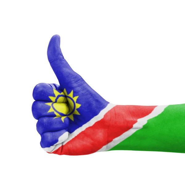 Mano con pollice in su, bandiera della Namibia dipinta come simbolo di eccellenza — Foto Stock