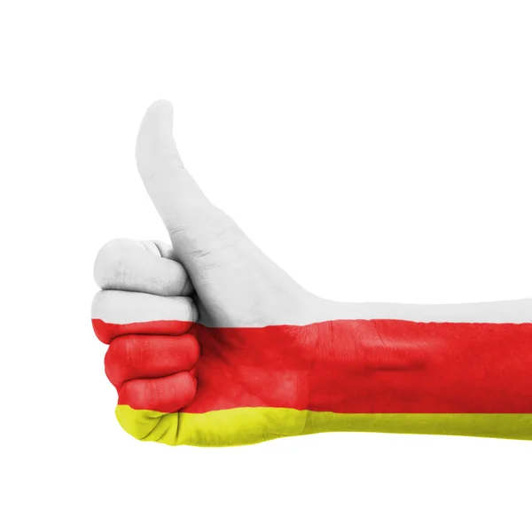 Kéz a hüvelykujjával felfelé, Dél-Oszétia zászlót festette, mint szimbólum a Ferenc — Stock Fotó