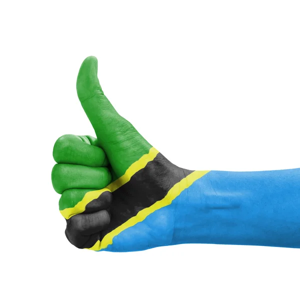 Рука с большим пальцем вверх, флаг Танзании, нарисованный как символ excellenc — стоковое фото