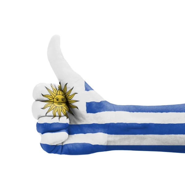 Mano con pulgar hacia arriba, bandera de Uruguay pintada como símbolo de excelencia — Foto de Stock