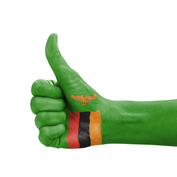 Mano con pollice in su, bandiera Zambia dipinta come simbolo di eccellenza , — Foto Stock