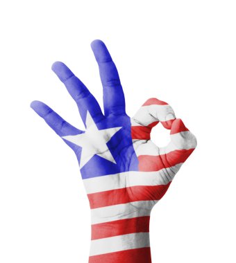 Hand making Ok sign, Liberia flag painted as symbol of best qual clipart