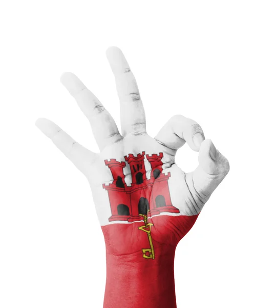 Hand making Ok sign, Gibraltar flag painted as symbol of best qu — Stock Photo, Image