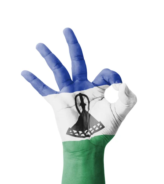 Hand making Ok sign, Lesotho flag painted as symbol of best qual — Stock Photo, Image