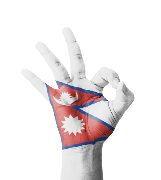 Hand macht ok Zeichen, nepal Flagge als Symbol der besten Qualität gemalt — Stockfoto