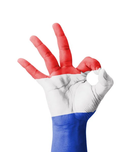 Hand making Ok sign, Netherlands flag painted as symbol of best — Stock Photo, Image