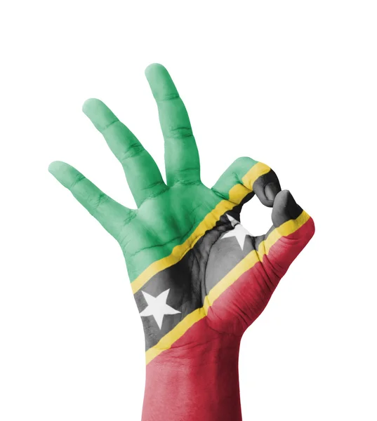 Hand making Ok sign, Saint Kitts and Nevis flag painted as symbo — Stock Photo, Image