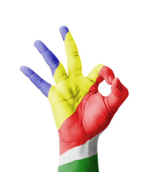 Hand making Ok sign, Seychelles flag painted as symbol of best q — Stock Photo, Image