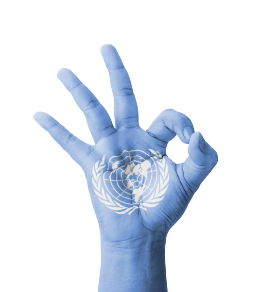 Hand making Ok sign, UN (United Nations) flag painted as symbol — Stock Photo, Image